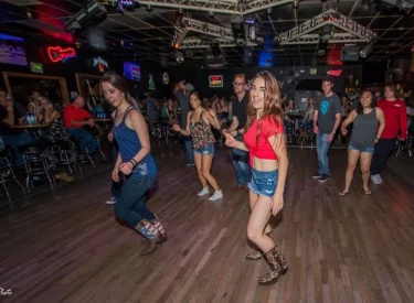 Group of adults line dancing